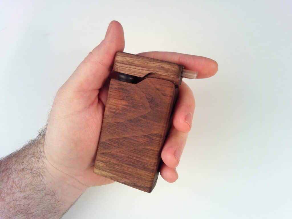 Firewood 4 vaporizer in hand of reviewer