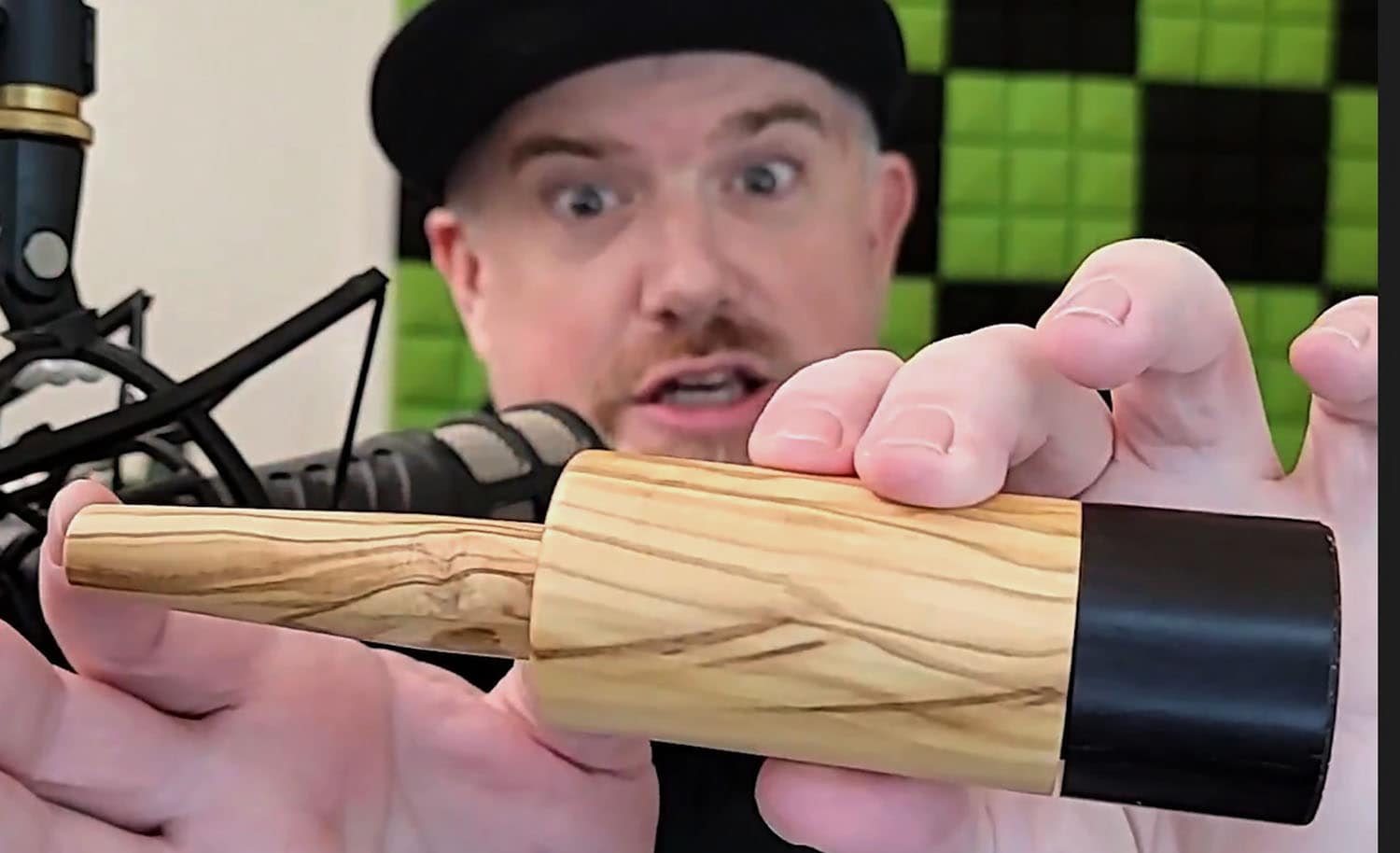 Troy from 420vapezone holding the CouchLog with stem attached