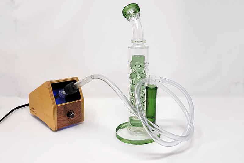 Vapor Brothers VB1.5 Desktop Vape hooks up to a glass bong with the included adapter