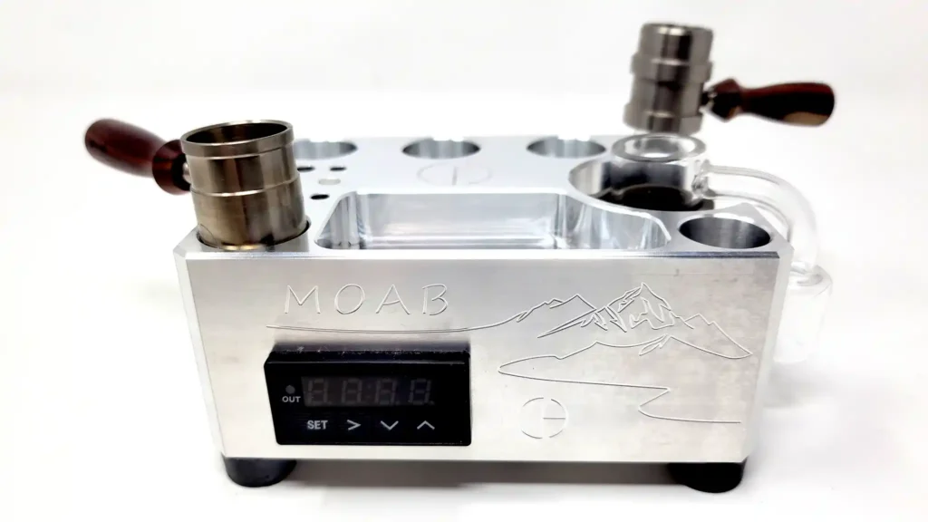 Cannabis Hardware's MOAB wireless desktop with the Mercury ball vape and a quartz banger