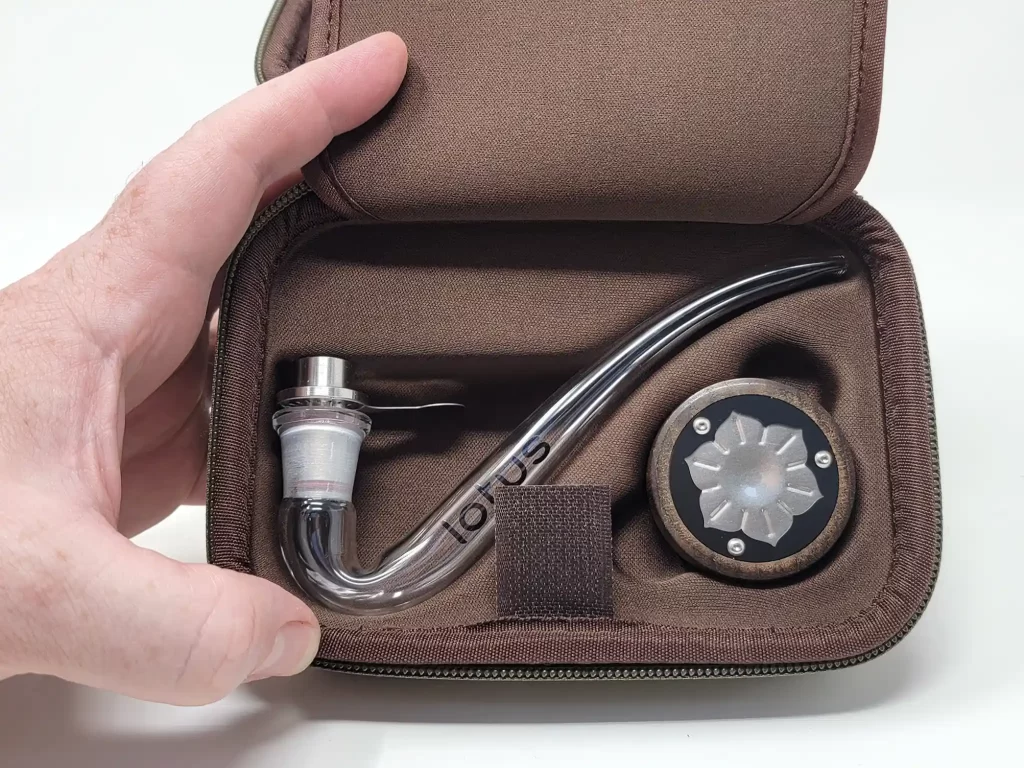 Lotus Vape comes with a glass j-hook and a 14mm metal bowl