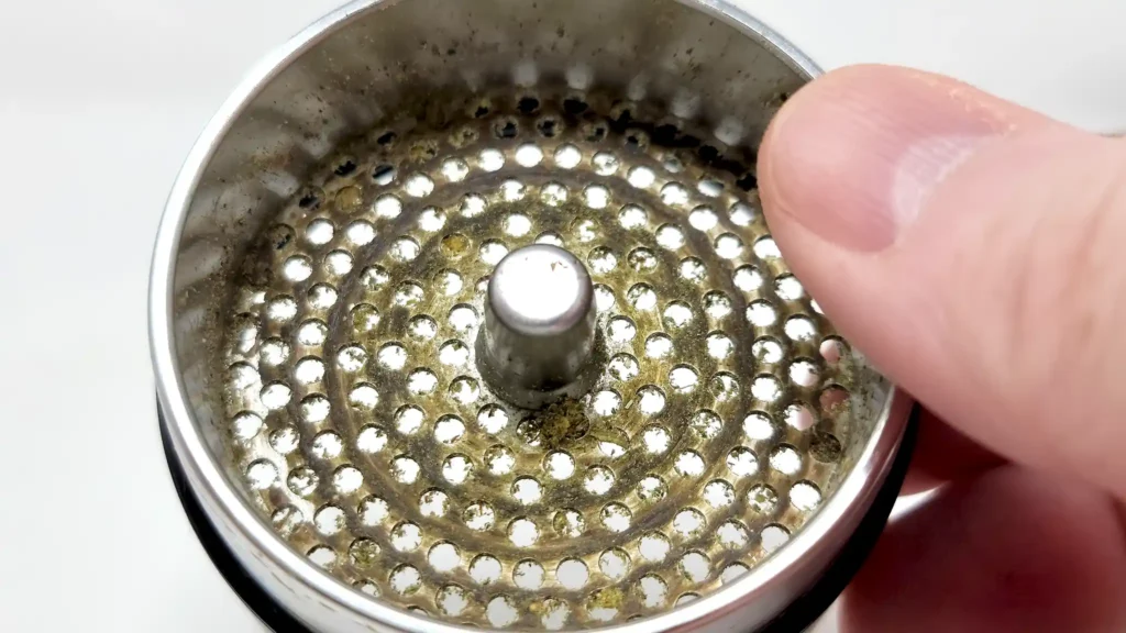 The Flower Mill Super Fine grinder plate after more than 8 ounces of sticky flower