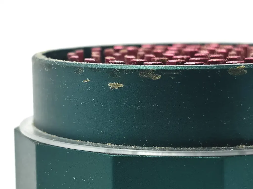 Top edge of the CAPU grinder with small bits of hash buildup