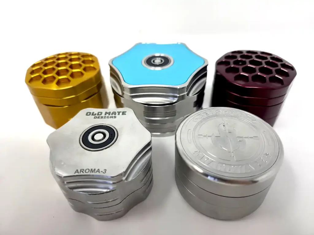 All of the available spinning weed grinders - Bud Bee, Old Mate, and Cyber Grinder