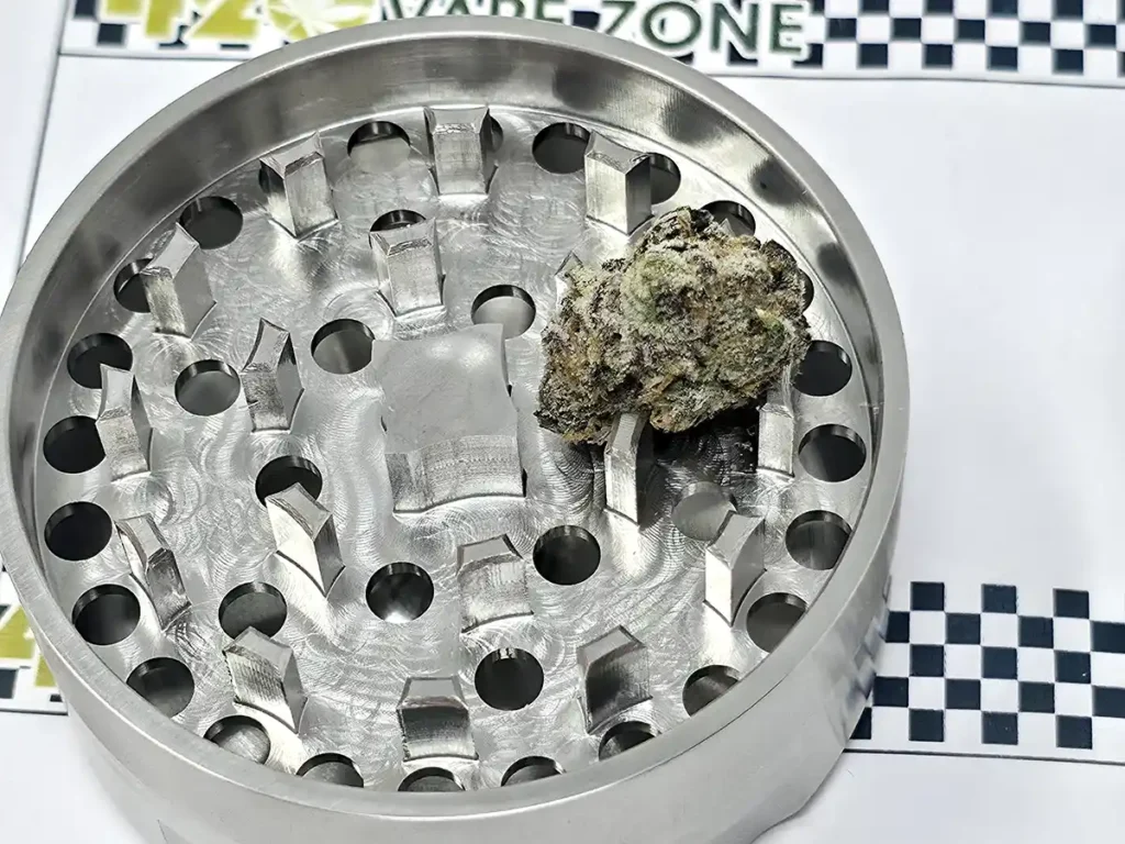 Draken 2 grinder test nug placed into teeth