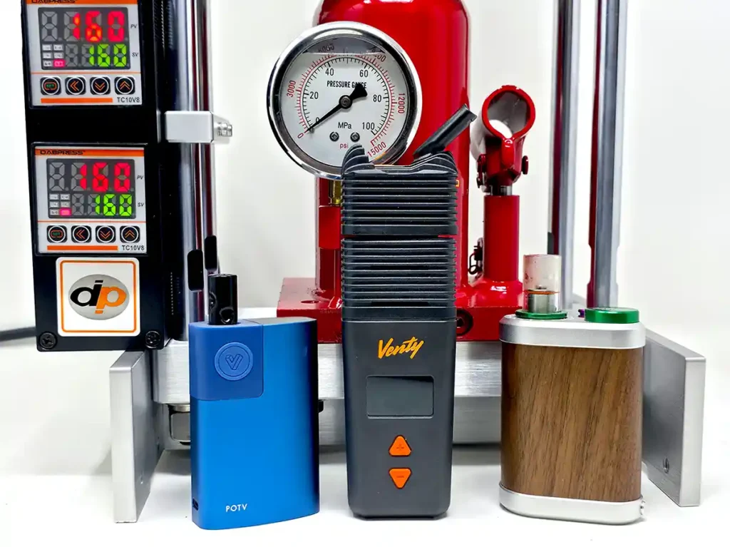 Lobo, Venty, and Tinymight vaporizers in front of 10 Ton TrueBar Dabpress