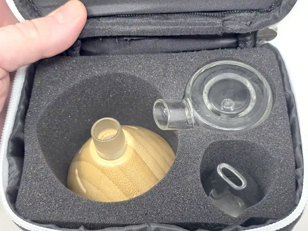 Bottom half of the Fuji Case hold the vaporizer and the two glass tops