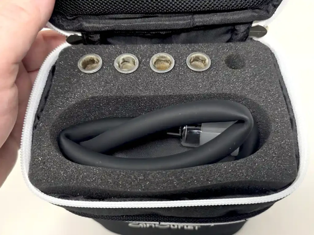 Upper half of the Fuji vaporizer case holds the whip and 5 Fuji bowls